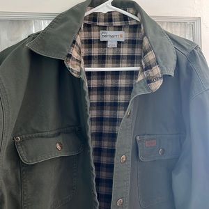 Carhartt Men’s Large lined jacket. Green with plaid inside. Or a Heavy shirt.